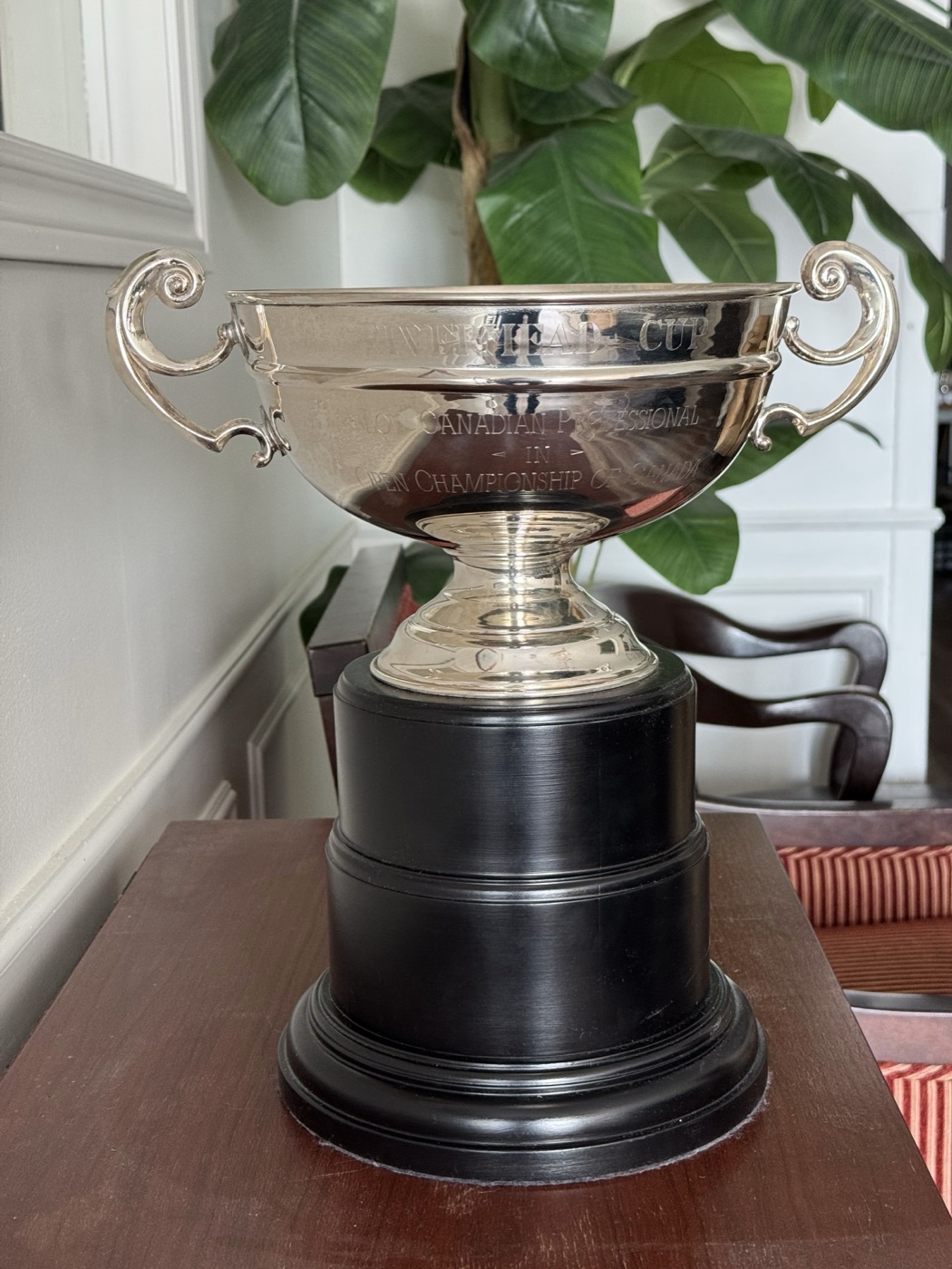 The silver Rivermead Cup on its black plinth, engraved 'Low Canadian Professional in Open Championship of Canada'